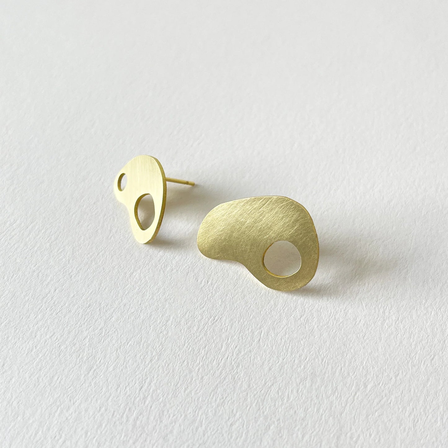Adder Earrings in Brass
