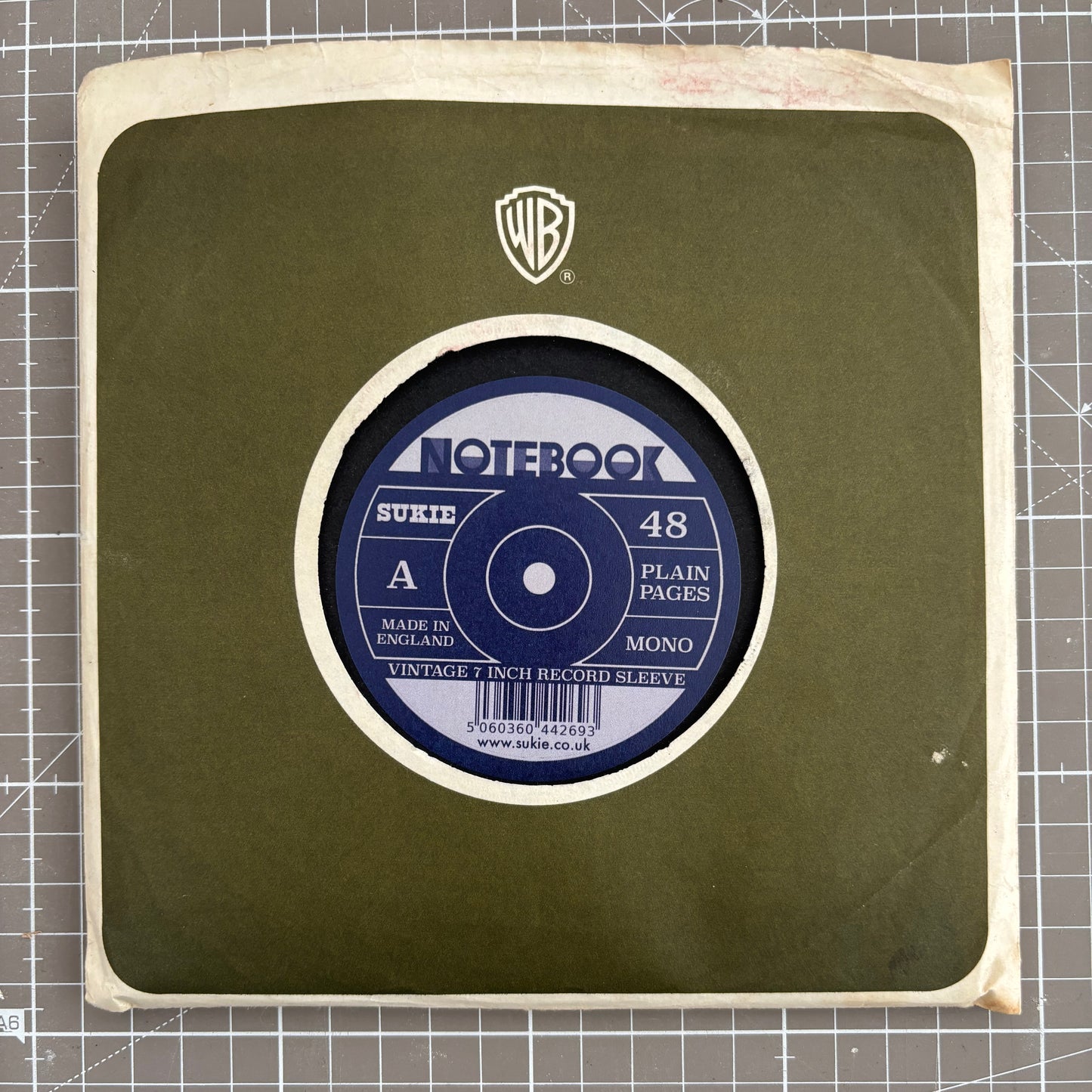 Record Sleeve Notebook with an original 7" vintage record sleeve.