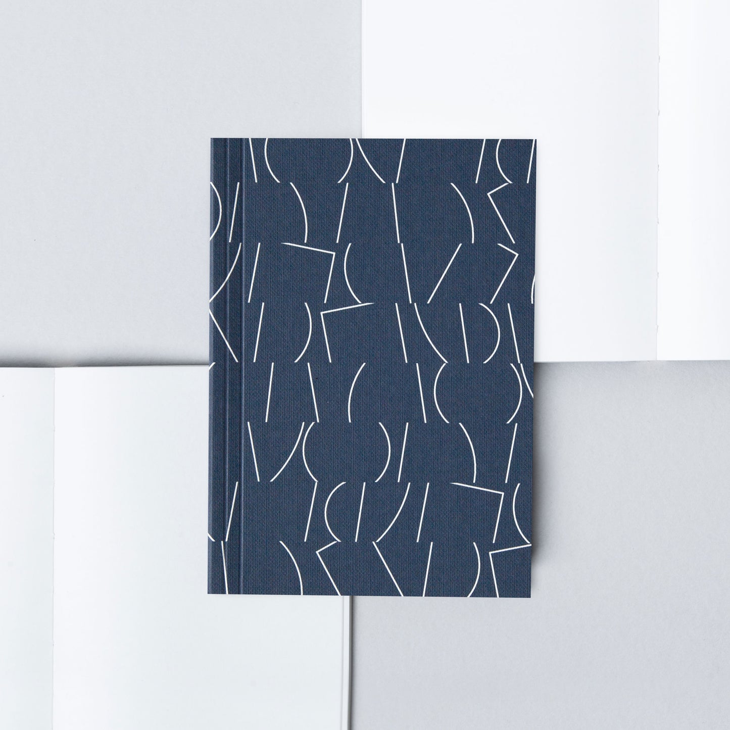 A6 Layflat Notebook plain pages - Sol print in Navy