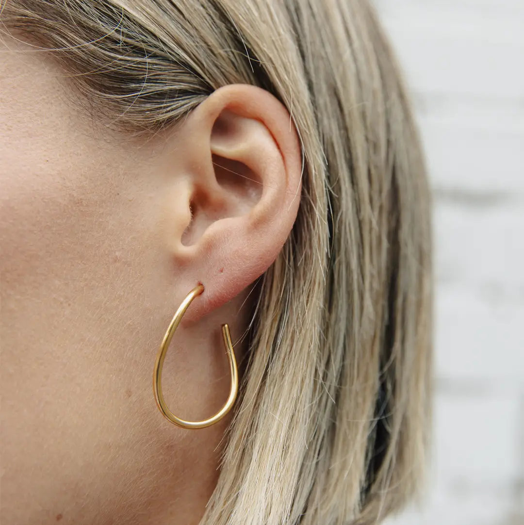 Oval Fluid Hoop Earrings in Gold
