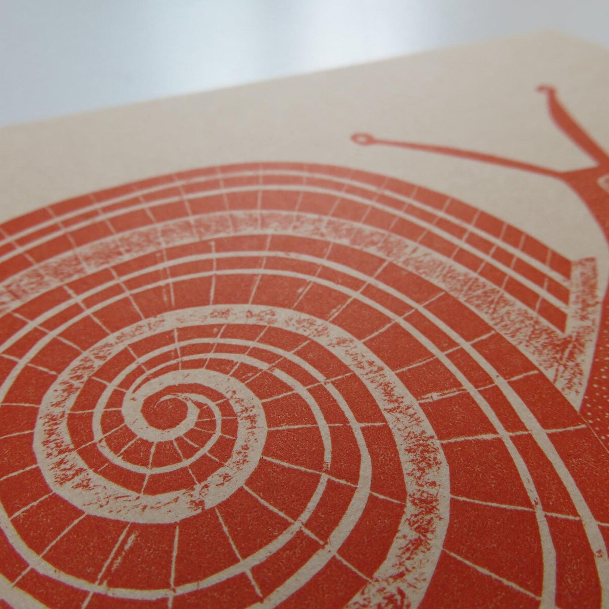 Snail Collagraph Print in Rust