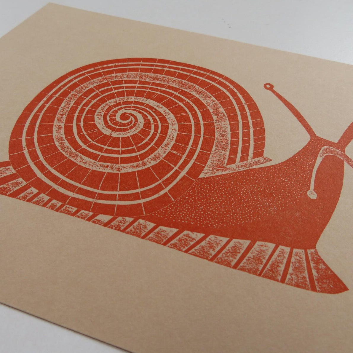 Snail Collagraph Print in Rust