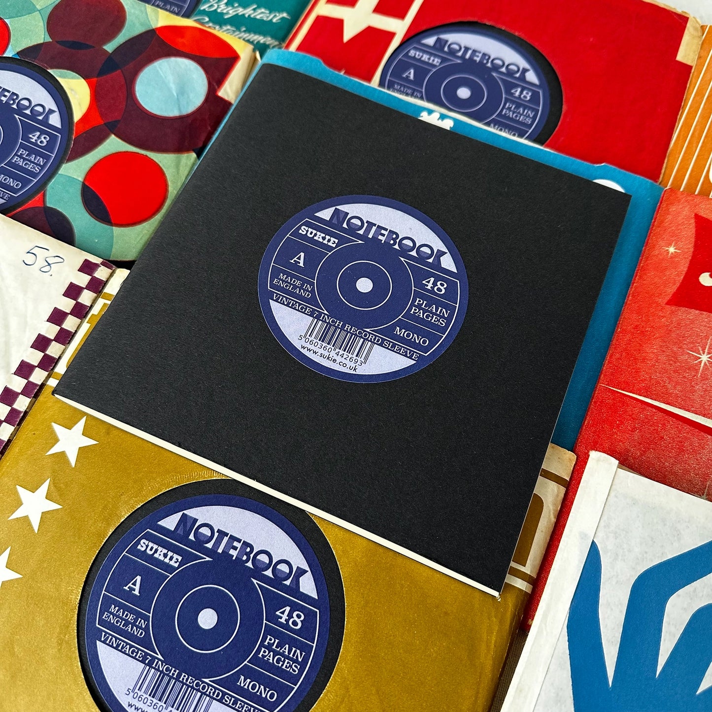 Record Sleeve Notebook with an original 7" vintage record sleeve.
