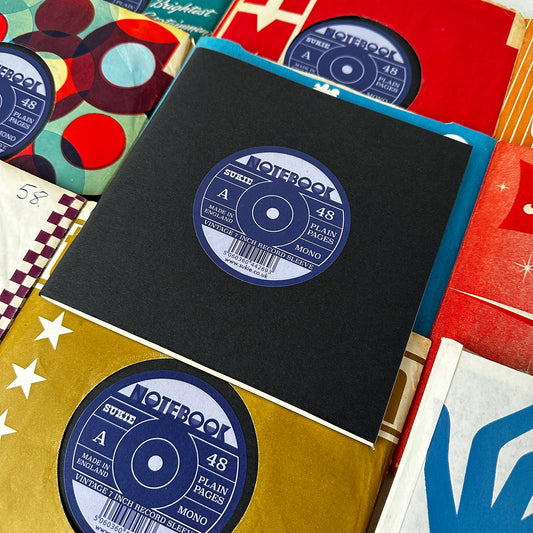 Record Sleeve Notebook with an original 7" vintage record sleeve.
