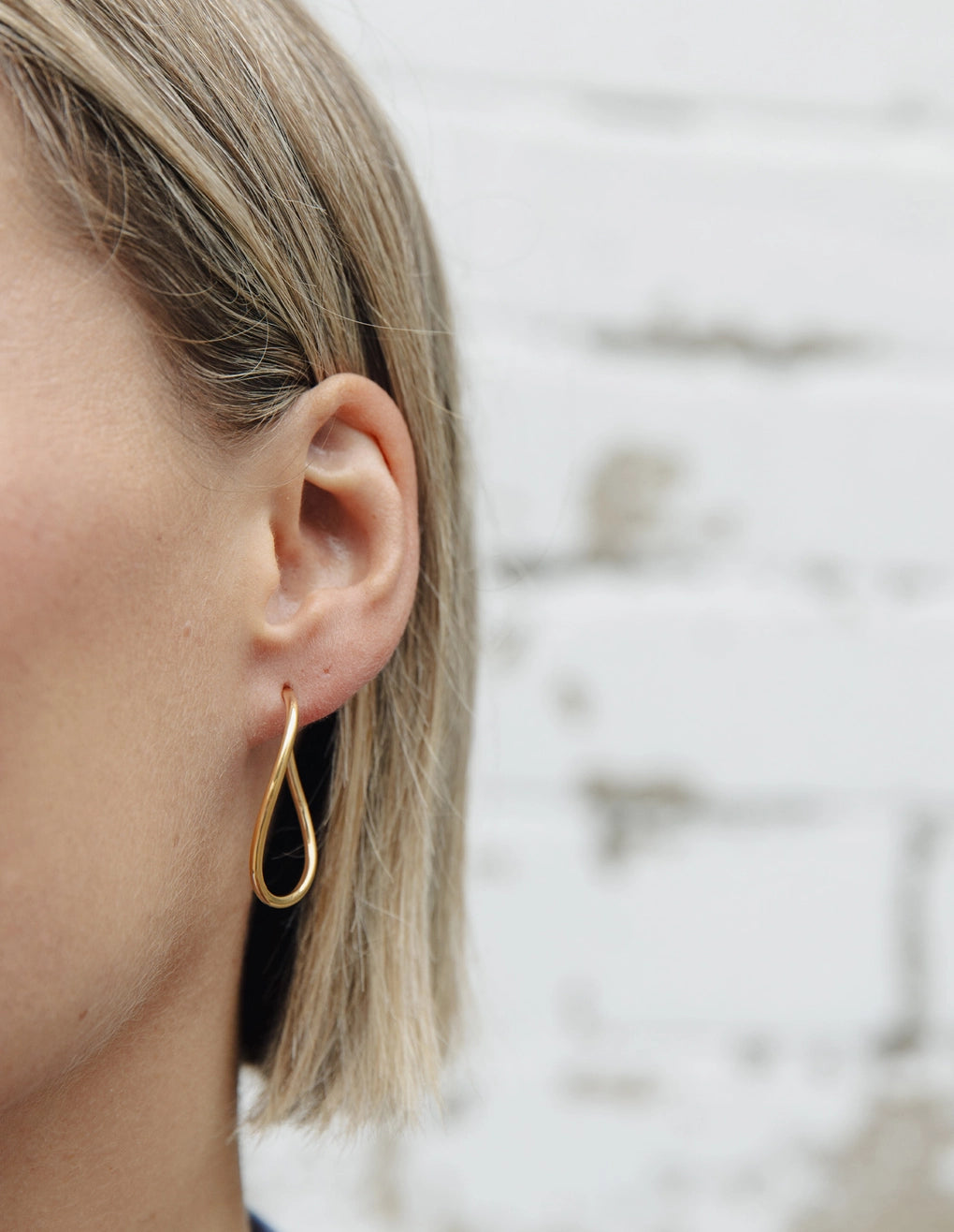 Oval Fluid Hoop Earrings in Gold