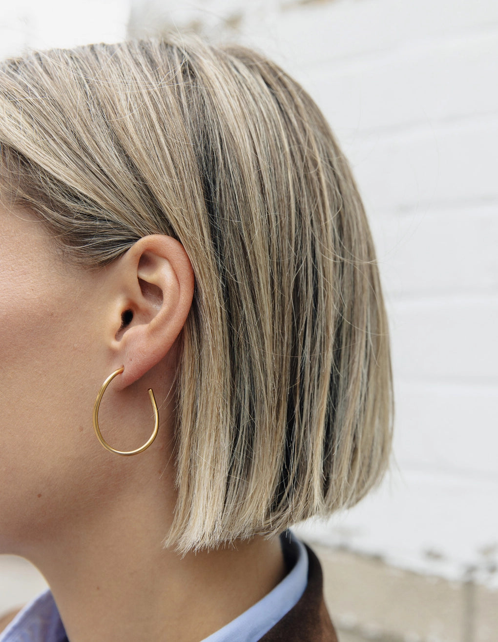Oval Fluid Hoop Earrings in Gold