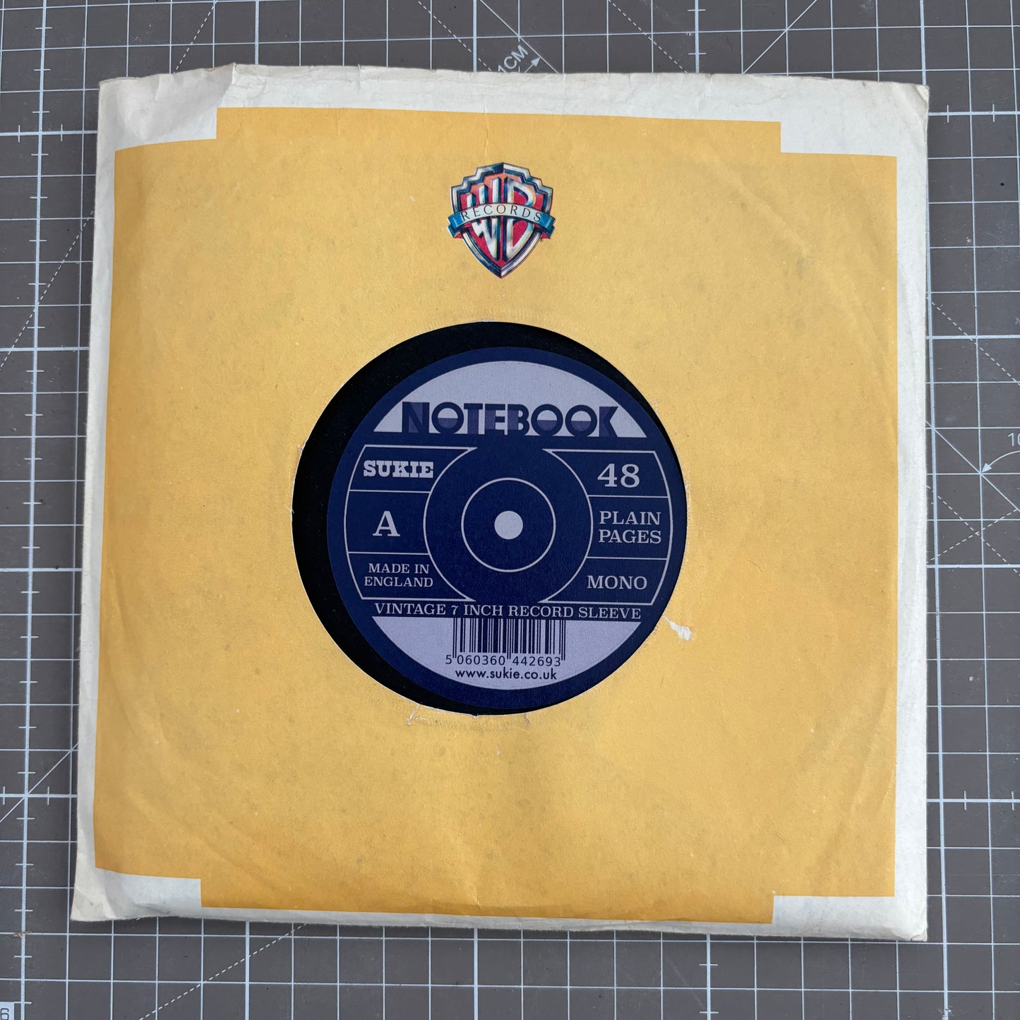 Record Sleeve Notebook with an original 7" vintage record sleeve.