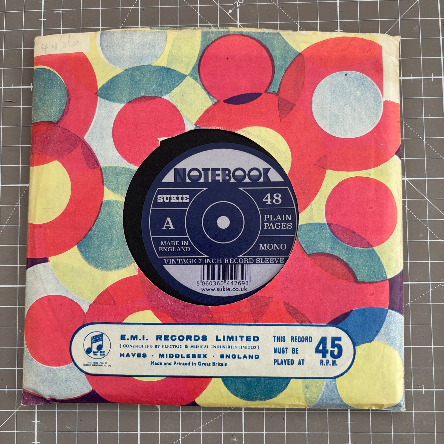 Record Sleeve Notebook with an original 7" vintage record sleeve.